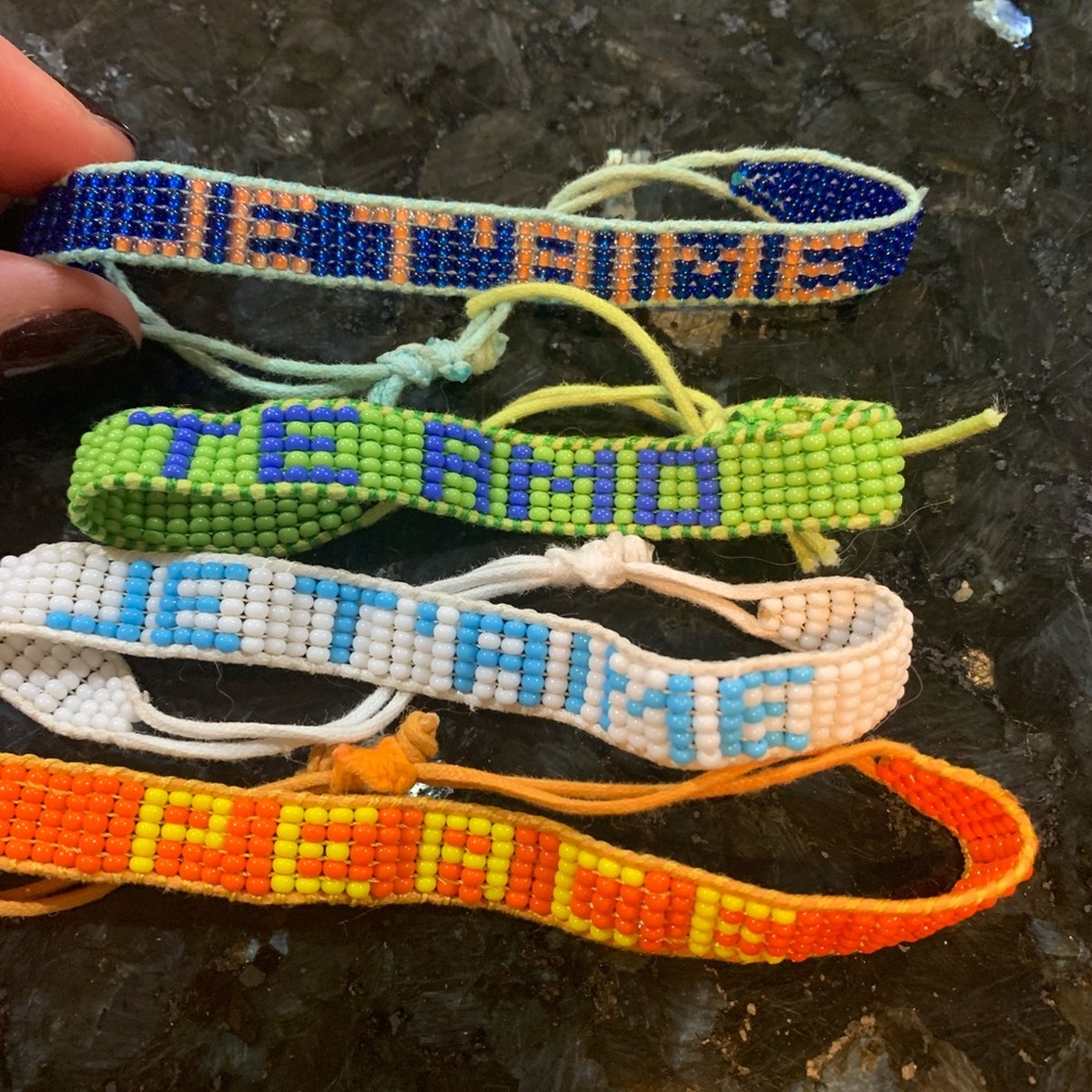 Set of four Ubuntu bracelets - various colors of beaded bracelets